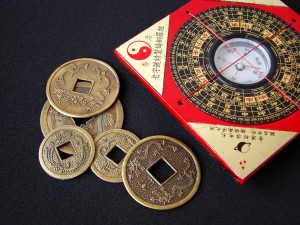 Feng shui compass and chinese coins.